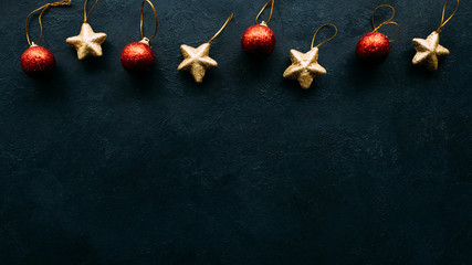 Christmas toys on blue background. Copyspace border concept