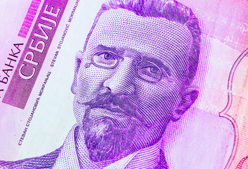Serbian 50 dinar currency banknote, close up. Serbia money RSD cash, macro view, portrait of Stevan Mokranjac.