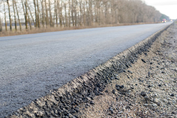 Layer of new laid asphalt, road construction