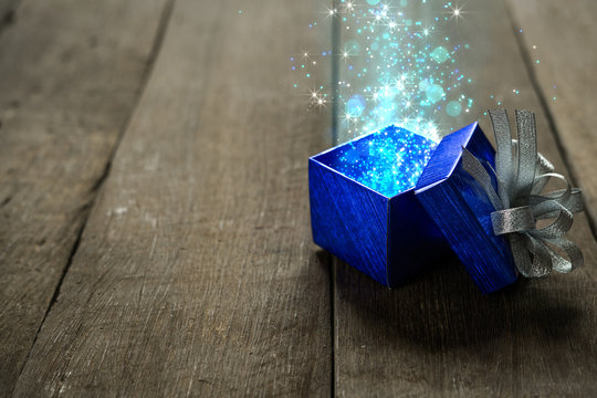 Christmas Gift Box With Blue Magical Lights