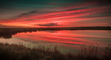 Fototapeta na wymiar Lake in the sunset