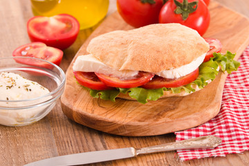 Puccia bread with mozzarella and tomato. 