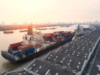 Naklejka premium container,container ship in import export and business logistic,By crane,Trade Port , Shipping,cargo to harbor.Aerial view,Water transport,International,Shell Marine,transportation,logistic,trade,port