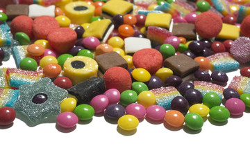 Fototapeta na wymiar colorful candies of various kind and dimension 