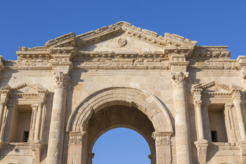 Fototapeta na wymiar Hadrian's Arch in the ancient roman town Jerash in Jordan