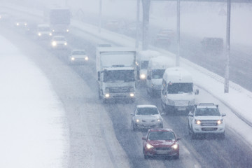 Traffic in a snowstorm