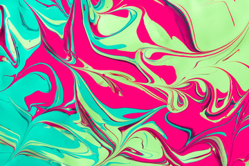 Liquid marbling acrylic paint background. Fluid painting abstrac