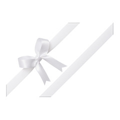 White bow tied using silk ribbon, cut out top view, corner
