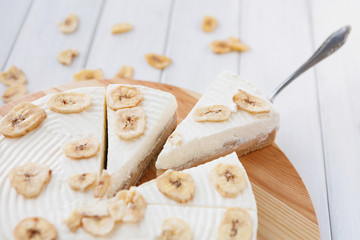 Delicious banana cake on table