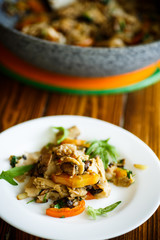 Buckwheat noodles with fried mushrooms and vegetables