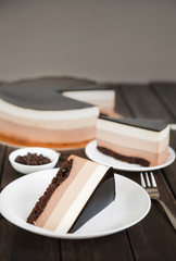 Triple chocolate layer mousse cake with glaze