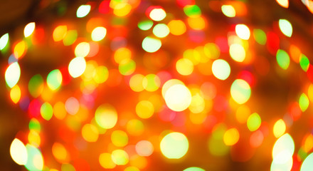 Fototapeta premium Color light blurred bokeh background, unfocused.