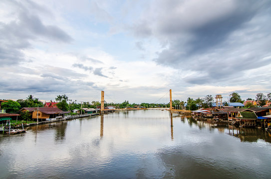 the favourite floating market in Samut Songkram Provine thailand, with golden sunshine in evening