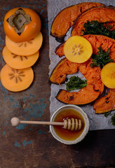 Baked Pumpkin with kale, persimmon and feta