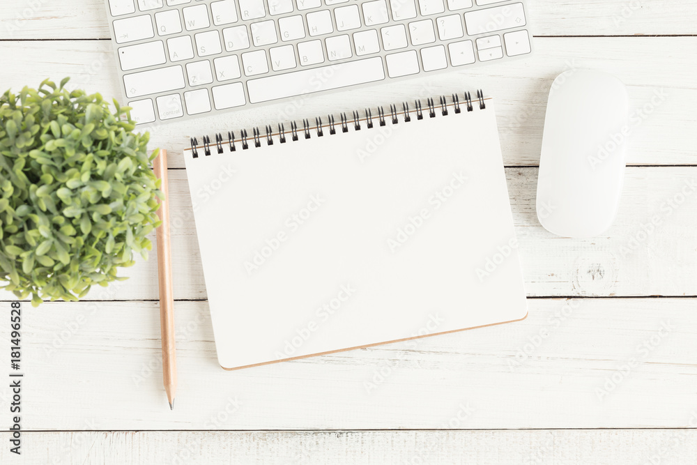 Wall mural flat lay photo of office desk with mouse and keyboard,empty open notebook on white wood table top vi