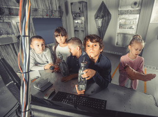 Fototapeta na wymiar children play in the quest room of a inscrutable bunker