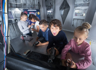 Obraz na płótnie Canvas Children playing in bunker questroom
