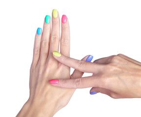 Female fingers with fancy  nails manicure isolated on white background