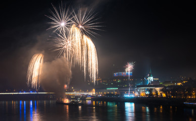 Naklejka na ściany i meble New Year Celebration. Fireworks on Danube River in Bratisalva, Slovakia