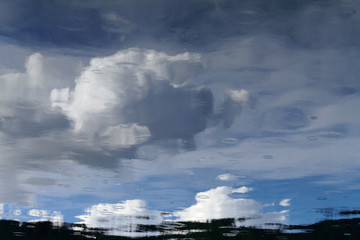 Fototapeta na wymiar Reflection of clouds on water