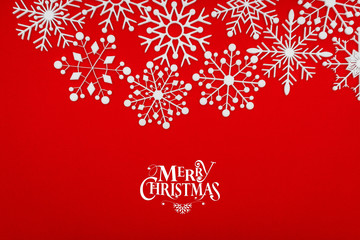 Vintage Christmas postcard with true paper snowflakes .