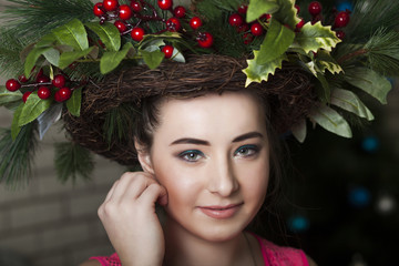  Portrait of a beautiful girl with a Christmas hairdo