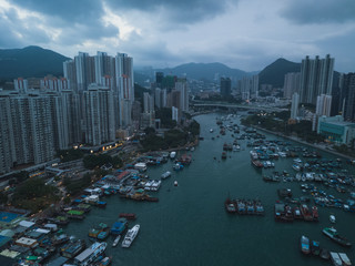 Fototapeta na wymiar Aerial Top View of The Aberdeen Bay and the buildings on two sides of the harbour in Hong Kong.