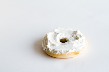 Half bagel with cream cheese
