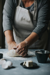 Fototapeta na wymiar Woman working with dough 