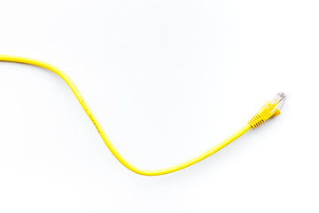 Yellow network wires with tips on white background top view copyspace