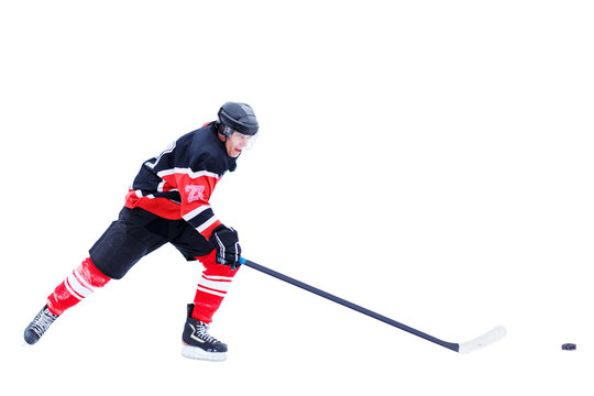 Ice hockey skater in attack isolated on white background