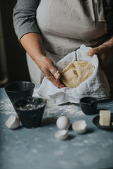 Woman working with dough  