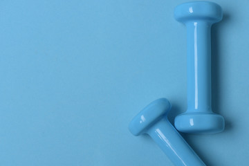 Barbells in small size, topview and copy space. Healthy lifestyle