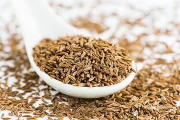 cumin on white background.Selective focus