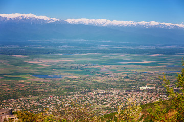 View of Signagi and Alazani Valley with snow on Caucasus mountain chain