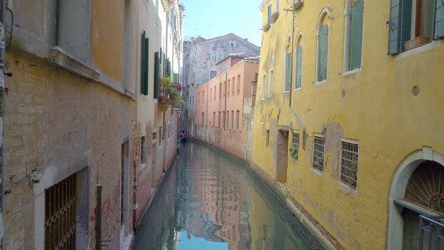 14730_The_view_of_the_canal_in_Venice_with_buildings_surrounding_it_in_Italy.mov