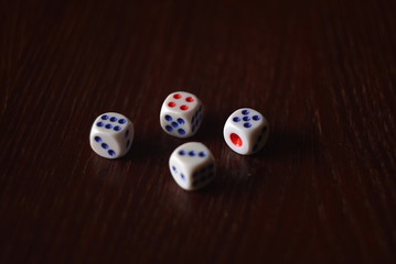 Plastic Dice on a wooden table
