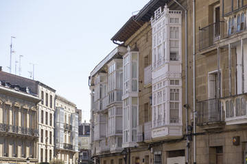 Fototapeta na wymiar street with white balconies