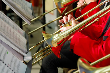 Musician playing on trumpet