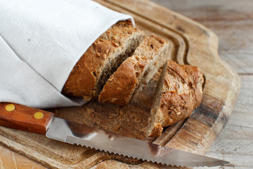 Wholemeal Bread on a Wooden Table
