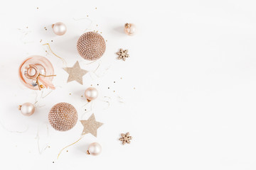 Christmas composition. Christmas balls, golden decorations on white background. Flat lay, top view, copy space