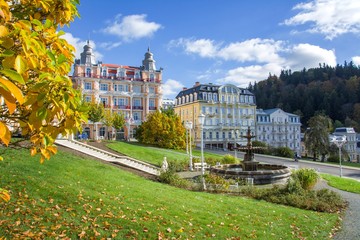 Goethe square and public park with fountain and spa houses in autumn - center of Marianske Lazne...