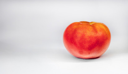 Red fresh Tomato isolated on white background closeup 