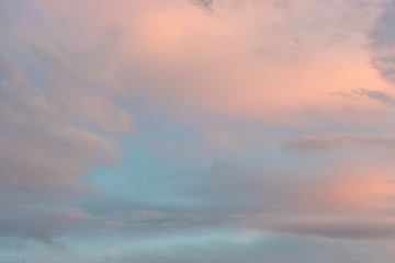 Naklejka na ściany i meble Sunset sky with multicolor clouds.