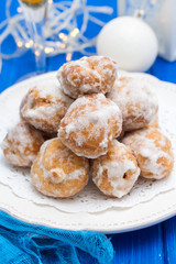 portuguese sweets cavacas on white plate on wooden background