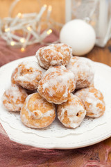 portuguese sweets cavacas on white plate on wooden background