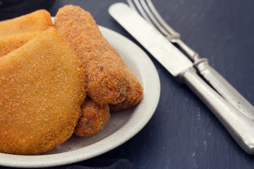 portuguese meat appetizer croquettes and rissois