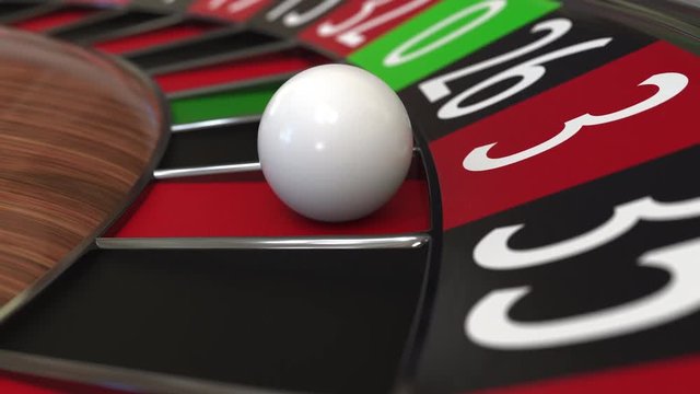 Casino roulette wheel ball hits 3 three red