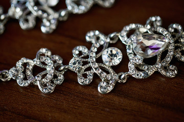 silver luxury earrings on the table