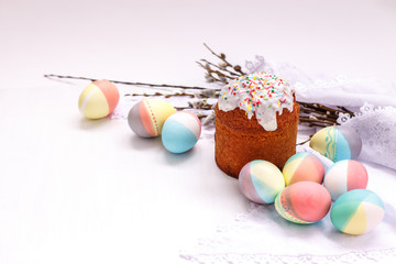 Easter cake, painted eggs on a white Lacy napkin